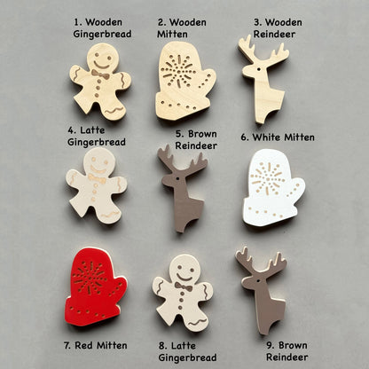 Handmade wooden wall hooks in Christmas theme — reindeer, mitten, and gingerbread man. Ideal for festive nursery decoration or as a cute kids’ room accent. Perfect as a sustainable holiday or baby gift, designed in a clean, Scandinavian style. Choose your style to make Christmas even more special.